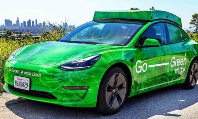 Green Uber Tesla