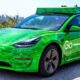 Green Uber Tesla