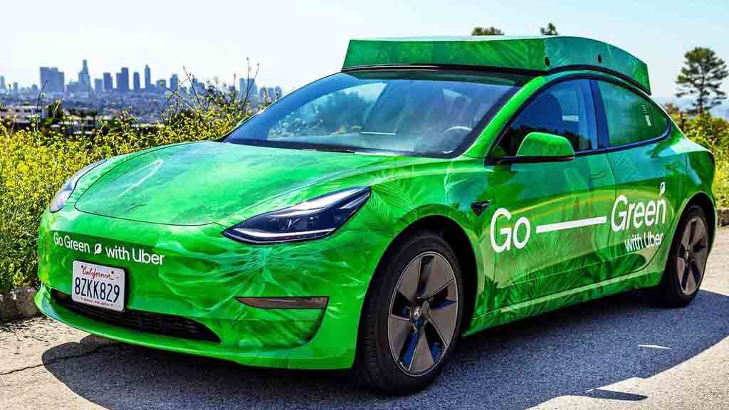 Green Uber Tesla