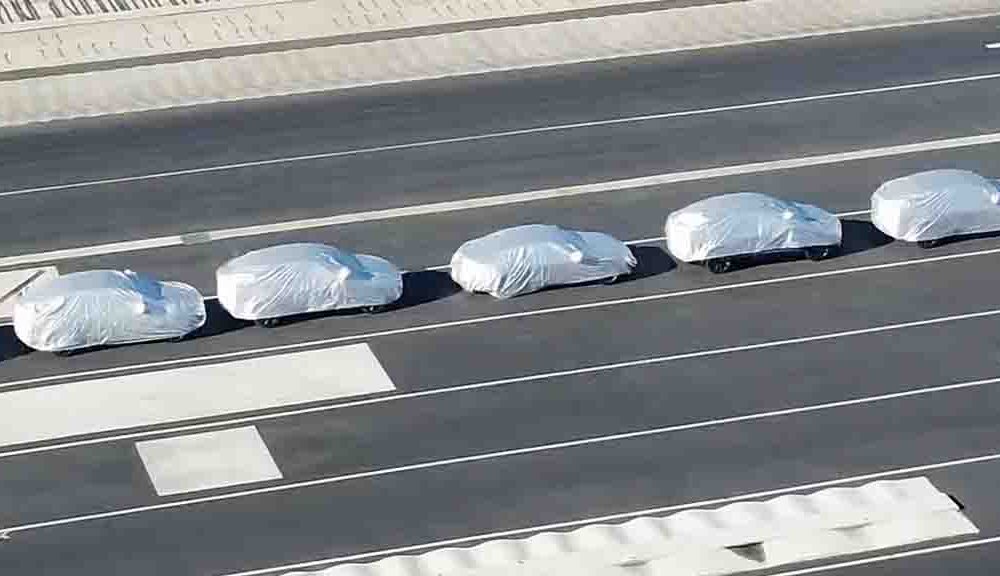 Several Covered Tesla at Fremont Factory