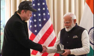 SpaceX Founder Elon Musk handing over a gift to Indian Prime Minister Narendra Modi