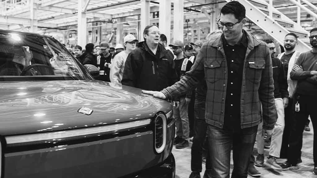Rivian CEO, RJ Scaringe, sharing the view with R2 manufacturing validation builds
